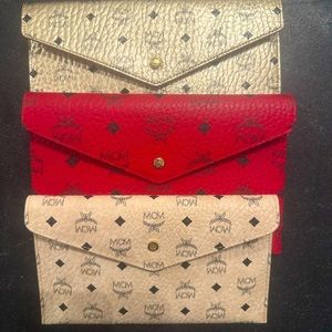 TRIO OF MCM POUCHES